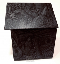 A birdhouse with several birds drawn on it